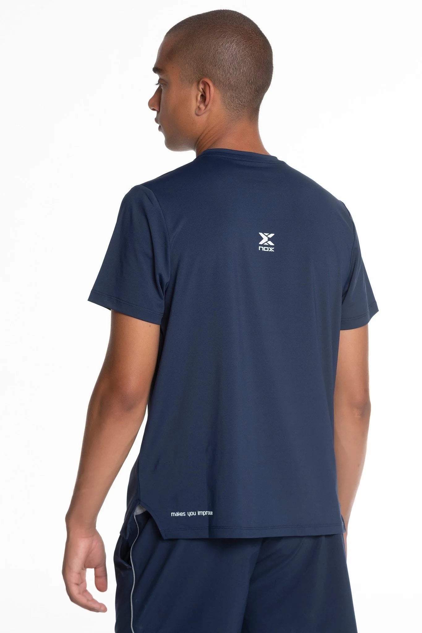 Men’s navy padel t-shirt side view on model close up